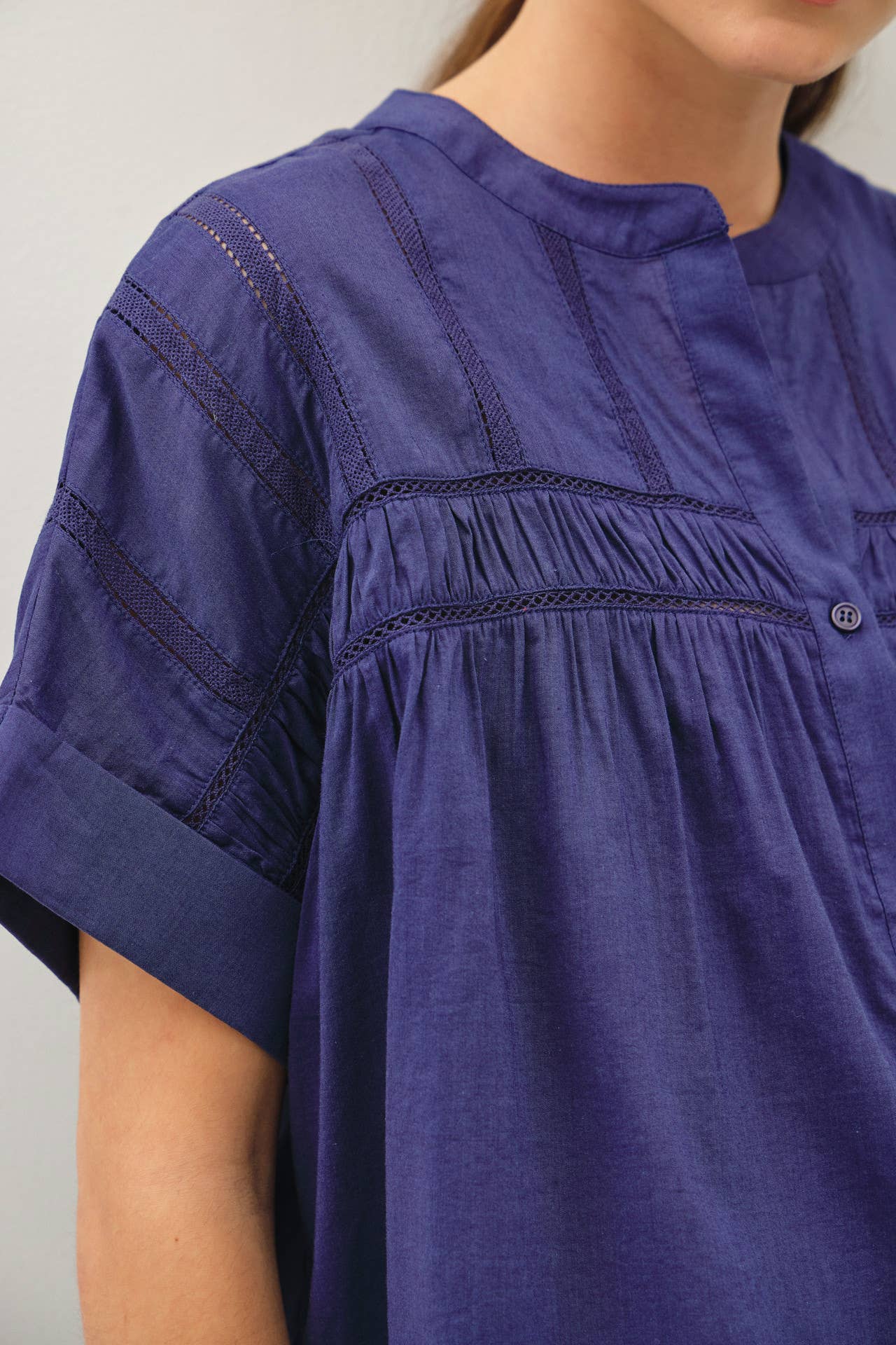 Eyelet Laced Dolman Sleeve