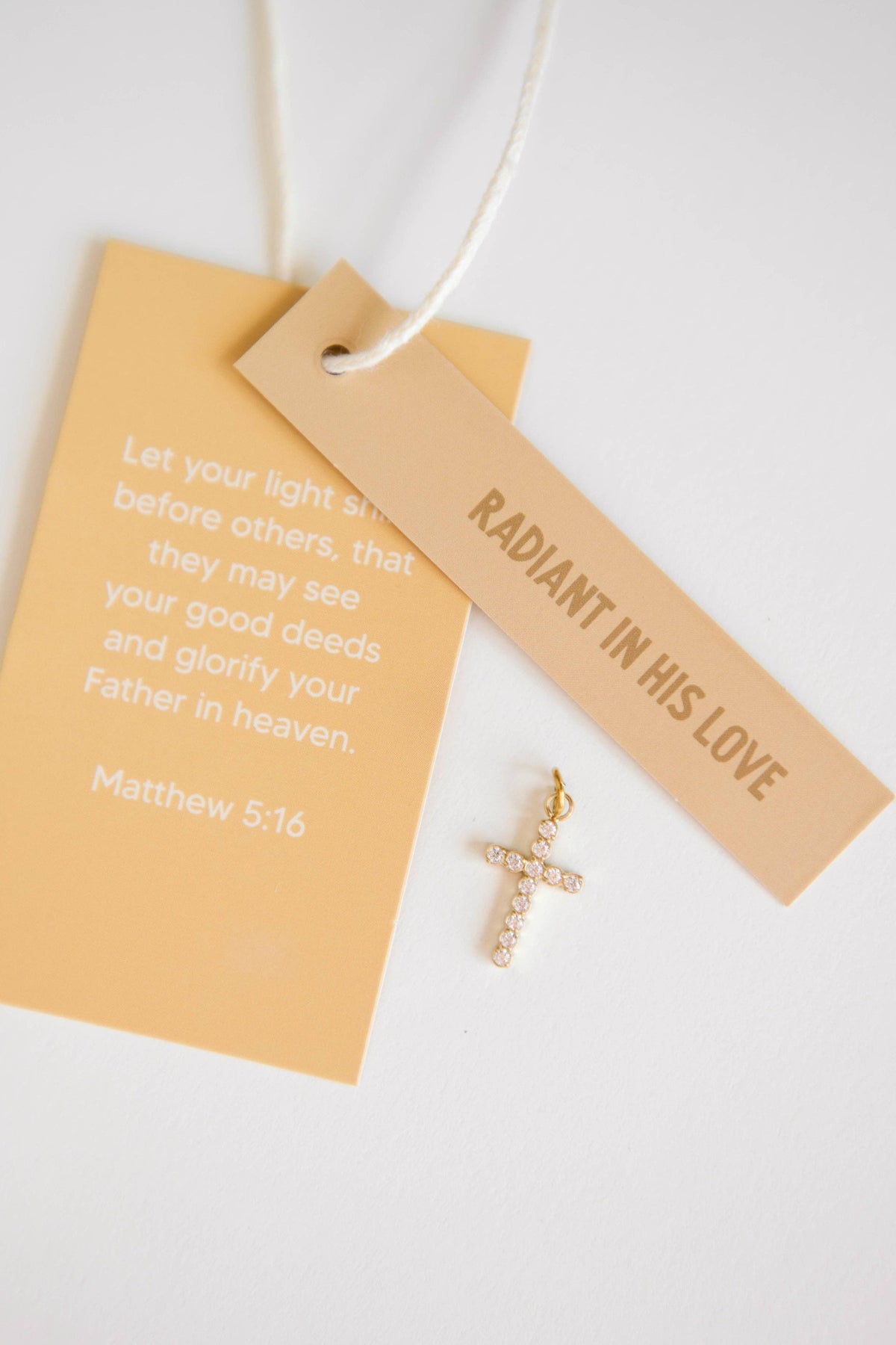 Radiant Cross Charm
